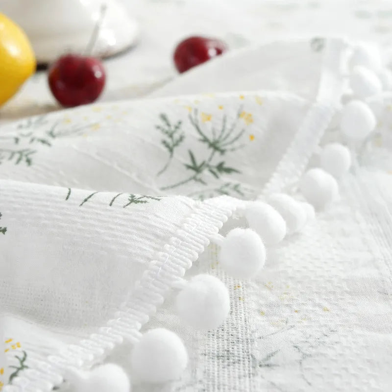 Nappe ronde en coton avec pompon